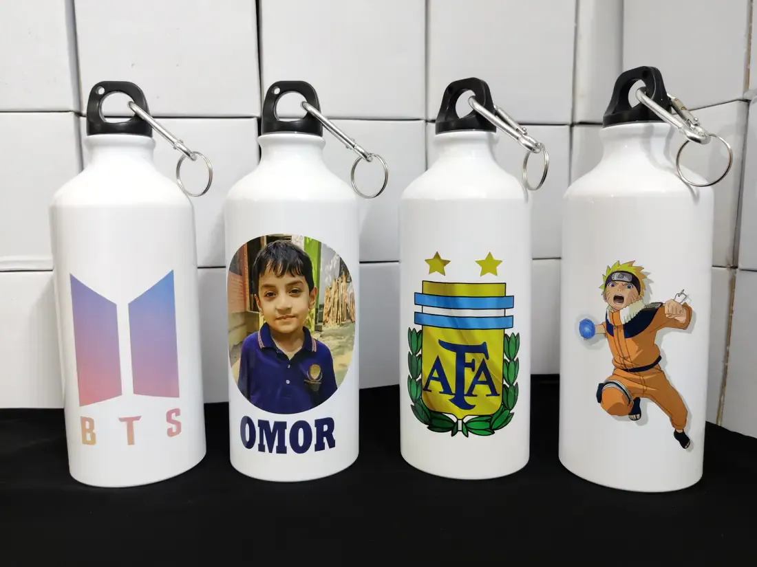 Four personalized printed bottles