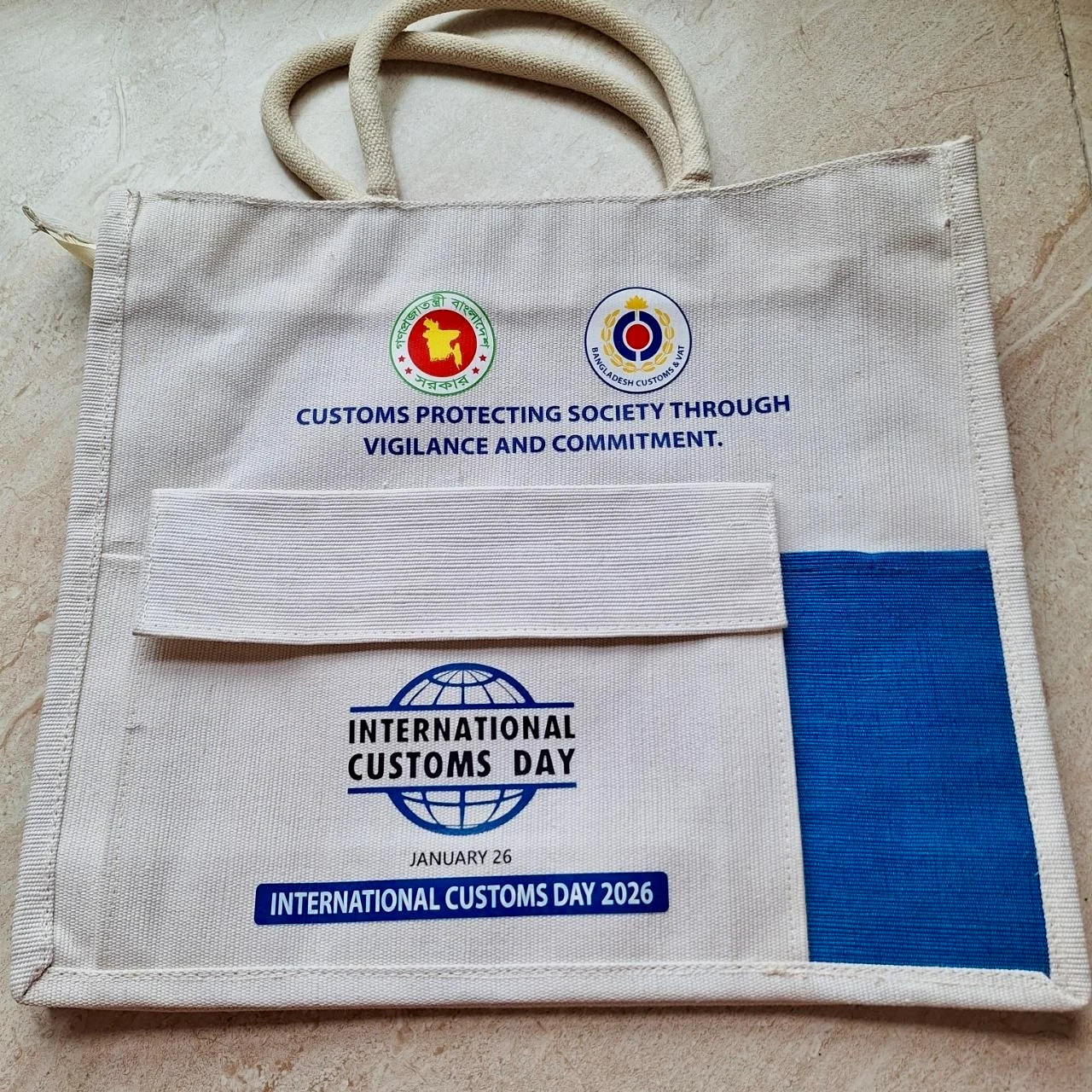 Natural and blue bag printed for International Customs Day
