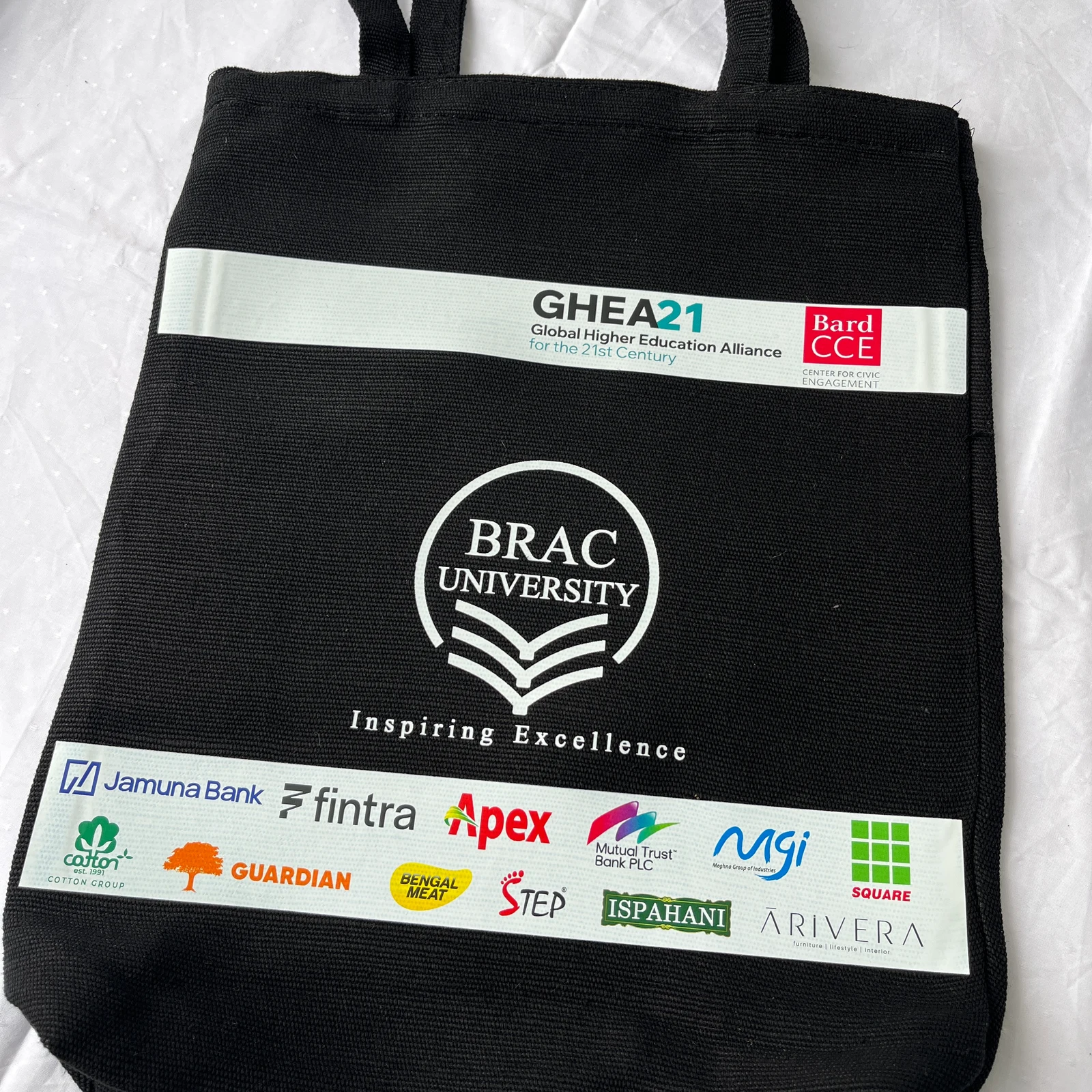 Black BRAC University tote with event sponsor printing
